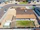 An aerial view of this home's roof and backyard landscaping, including a covered patio at 3301 E Sharon Dr, Phoenix, AZ 85032