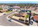 This home features a detached garage, desert landscaping, and a covered patio at 3301 E Sharon Dr, Phoenix, AZ 85032
