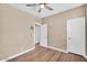 This bedroom features wood-style floors and neutral paint tones at 3443 E Thornton Ave, Gilbert, AZ 85297