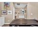 View of the home office showing the built-in shelves and desk at 3443 E Thornton Ave, Gilbert, AZ 85297