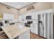 Spacious kitchen with granite countertops, stainless steel appliances, and ample cabinet space at 3443 E Thornton Ave, Gilbert, AZ 85297
