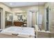 Luxurious bathroom features a large soaking tub, separate shower, and dual vanities, perfect for relaxation at 36389 N 105Th Pl, Scottsdale, AZ 85262