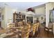 Spacious dining room showcases a large wooden table and hutch, perfect for entertaining at 36389 N 105Th Pl, Scottsdale, AZ 85262