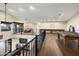 Large game room with pool table, seating area, and access to an outdoor balcony at 36389 N 105Th Pl, Scottsdale, AZ 85262