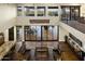 Spacious great room with vaulted ceilings, a balcony, and elegant furnishings at 36389 N 105Th Pl, Scottsdale, AZ 85262