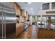 Spacious kitchen with a large island, stainless steel refrigerator, and premium cooking appliances at 36389 N 105Th Pl, Scottsdale, AZ 85262