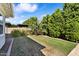 Lush backyard with mature greenery offers a private outdoor retreat at 3648 E Arabian Dr, Gilbert, AZ 85296