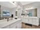 Large bathroom with dual sinks, lots of counter space and light at 3648 E Arabian Dr, Gilbert, AZ 85296