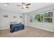 Bright primary bedroom features a large window and neutral-toned walls at 3648 E Arabian Dr, Gilbert, AZ 85296