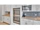 Gleaming stainless appliances accent the beautifully appointed kitchen at 3648 E Arabian Dr, Gilbert, AZ 85296