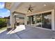 Covered patio featuring pavers, a grill, and sliding glass doors at 3648 E Arabian Dr, Gilbert, AZ 85296