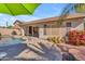 Backyard with a pool, desert landscaping, covered patio, and built-in barbecue, perfect for entertaining at 3841 E Redfield Ct, Gilbert, AZ 85234