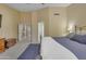 Tranquil bedroom featuring comfortable bedding and direct access to a private ensuite bathroom at 3841 E Redfield Ct, Gilbert, AZ 85234