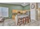 Inviting kitchen with stainless steel appliances, breakfast bar, and eat in kitchen at 3841 E Redfield Ct, Gilbert, AZ 85234