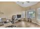 Spacious office with light wood floors and large windows for light at 3841 E Redfield Ct, Gilbert, AZ 85234