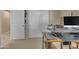 Bright office space with computer and shelves for storage at 3841 E Redfield Ct, Gilbert, AZ 85234