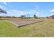 A community swingset in the park surrounded by lush green grass and clear blue skies at 3841 E Redfield Ct, Gilbert, AZ 85234