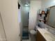 Small bathroom featuring neutral paint, tile floors and a functional vanity at 3937 W Stella Ln, Phoenix, AZ 85019