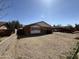 Quaint single-story home featuring a brick exterior, well-maintained landscaping and an expansive gravel driveway at 3937 W Stella Ln, Phoenix, AZ 85019