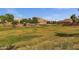 Expansive community park with a playground, picnic area, and open grassy spaces for recreation at 4027 W Copperleaf Dr, San Tan Valley, AZ 85144