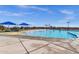 Resort-style community pool featuring splash pad, lap pool and relaxing lounge areas at 4027 W Copperleaf Dr, San Tan Valley, AZ 85144