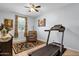 Exercise room with a treadmill, and comfortable seating area at 4027 W Copperleaf Dr, San Tan Valley, AZ 85144