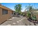 Landscaped backyard with brick accents and stepping stones, providing a tranquil outdoor retreat at 421 E Terrace Ave, Gilbert, AZ 85234
