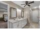 Bright bathroom featuring a double vanity, modern fixtures, and neutral-toned walls at 421 E Terrace Ave, Gilbert, AZ 85234