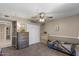Comfortable bedroom with a ceiling fan and ample storage at 421 E Terrace Ave, Gilbert, AZ 85234