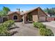 Charming home featuring a covered porch, flag and desert-friendly landscaping in the front yard at 421 E Terrace Ave, Gilbert, AZ 85234