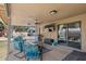 Covered patio with outdoor seating, ceiling fans, and barbecue, ideal for enjoying outdoor meals and entertainment at 421 E Terrace Ave, Gilbert, AZ 85234