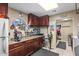 Functional utility room equipped with cabinets, a countertop, and space for various tools and equipment at 421 E Terrace Ave, Gilbert, AZ 85234
