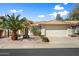 Charming home with a well-maintained front yard and attached two-car garage at 4546 E Villa Rita Dr, Phoenix, AZ 85032