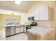 Bright kitchen with stainless steel appliances and sleek cabinetry at 4546 E Villa Rita Dr, Phoenix, AZ 85032
