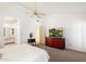 Bright main bedroom with neutral carpet, en-suite bath and ceiling fan at 4546 E Villa Rita Dr, Phoenix, AZ 85032