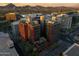 Impressive aerial showcasing modern buildings with mountain views and lush rooftop spaces at 4808 N 24Th St # 303, Phoenix, AZ 85016