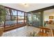 Enclosed balcony with tile flooring and large windows offering scenic city views at 4808 N 24Th St # 303, Phoenix, AZ 85016