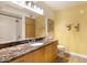 Bathroom with vanity, granite countertop, and seamless glass shower at 4808 N 24Th St # 303, Phoenix, AZ 85016