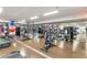 Well-equipped gym featuring modern machines, weights, and mirrored walls at 4808 N 24Th St # 303, Phoenix, AZ 85016