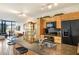 Kitchen featuring granite countertops, modern appliances, and views into the living area at 4808 N 24Th St # 303, Phoenix, AZ 85016
