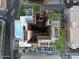 Detailed aerial of rooftop amenities: pool, gardens, and entertainment spaces await at 4808 N 24Th St # 303, Phoenix, AZ 85016