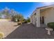Low maintenance backyard featuring desert landscaping, gravel and covered patio at 4815 E Fernwood Ct, Cave Creek, AZ 85331