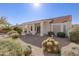 Spacious backyard with covered patio, low maintenance desert landscaping, and privacy at 4815 E Fernwood Ct, Cave Creek, AZ 85331