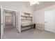 Spacious bedroom featuring built-in desk and storage cabinets at 4815 E Fernwood Ct, Cave Creek, AZ 85331