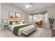Relaxing bedroom offers natural light, ceiling fan, neutral color scheme and decorative appointments at 4815 E Fernwood Ct, Cave Creek, AZ 85331