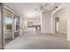 Spacious living room flows into the kitchen and features a sliding glass door for indoor/outdoor living at 4815 E Fernwood Ct, Cave Creek, AZ 85331