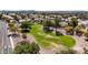 Expansive green space with mature trees, perfect for leisurely strolls and outdoor activities at 5811 W Irma Ln, Glendale, AZ 85308