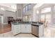 Spacious kitchen with island, granite countertops, and high-end appliances perfect for entertaining at 5811 W Irma Ln, Glendale, AZ 85308