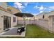 Beautiful backyard with a patio and artificial turf, perfect for relaxing and entertaining at 7010 W Downspell Dr, Peoria, AZ 85345