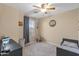 Bright bedroom with a ceiling fan and a decorative theme at 7010 W Downspell Dr, Peoria, AZ 85345
